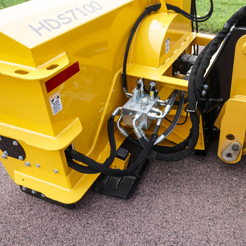 Close-up of HitchDoc hydraulic snowblower motor and hydraulic drive components