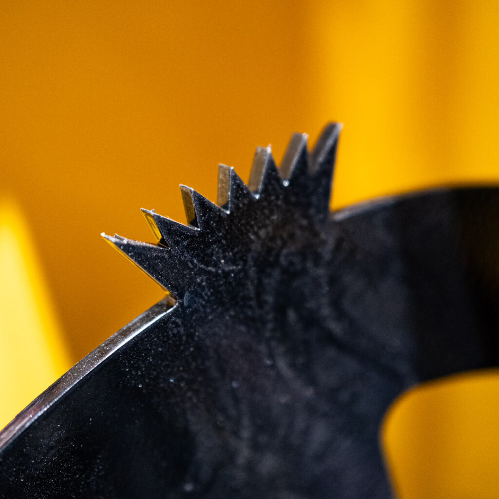Close-up of HitchDoc hydraulic snowblower tiger teeth designed to break through packed and heavy snow